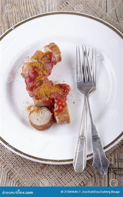 Curried Sausage With Ketchup On A Plate Stock Photo Image Of Grilled