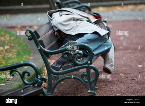 Homeless Man Sleeping On Bench Hi Res Stock Photography And Images Alamy