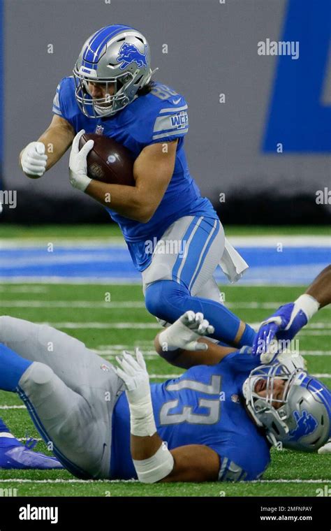 Detroit Lions Tight End T J Hockenson 88 Carries The Ball Against