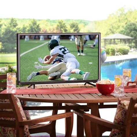 The 32" Portable TV/DVD Player - Hammacher Schlemmer