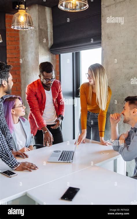 Diverse Multiethnic Group Of Young Businesspeople In Office Boardroom