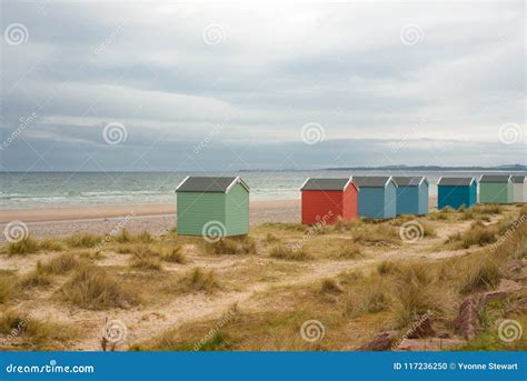 Colorful Wooden Huts On The Beach At Findhorn Moray Firth Scot Stock