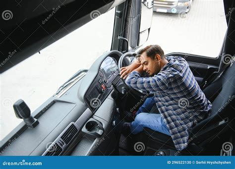 Portrait Of Tired Indian Truck Driver Feeling Sleepy And Sick Stock