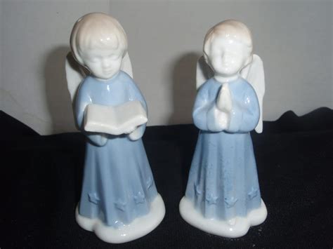 Blue and White porcelain Angel Figurines One is singing and