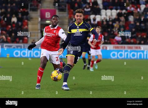 Christ Tiehi Of Rotherham United And Morgan Rogers Of