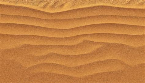 Um Plano De Fundo Uma Textura De Areia Marrom Fina Que Lembra Uma