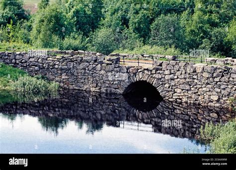 Old Stone Bridge Over Stream Stock Photo Alamy