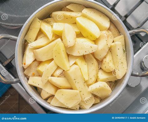 Cooking Potatoes In A Saucepan Top View Cooking Food Peeled Potatoes