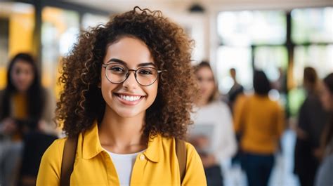 Premium Photo Portrait Of A Smiling Young Woman With Curly Hair