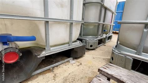 Container And Oil Drums Placed In A Chemical Storage Area Inside An