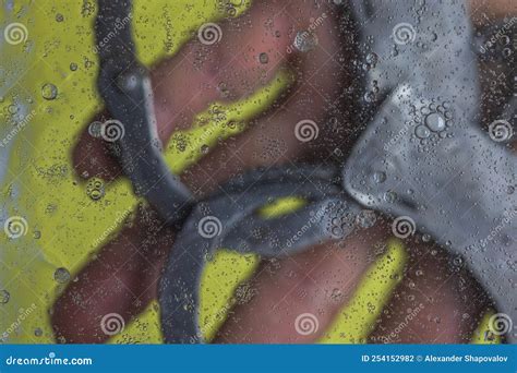 Close Up View Of Abstraction Texture Of Human Hands And Handcuffs