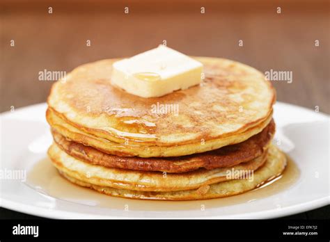 Classic pancakes with butter and syrup Stock Photo - Alamy