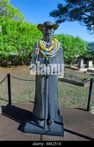 A statue of Father Damien outside St. Joseph's Church on the Pacific ...