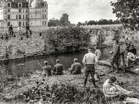 September 1918. "Shell Shock patients having a happy time fishing and swimming under the walls