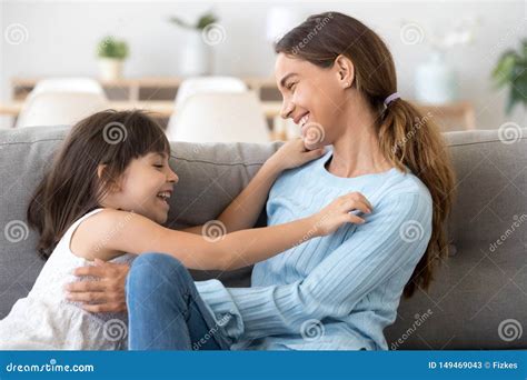 Playful Mom And Daughter Relax Having Fun At Home Stock Image Image