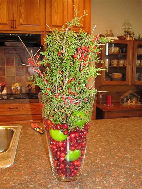 Festive Holiday Decor With Cranberries Limes And Cedar Branches