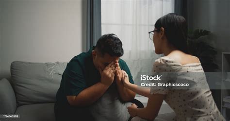 Asian Psychologist Sitting And Touching Hands Depressed Asian Man For