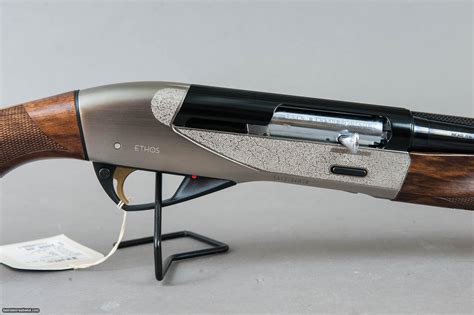 Benelli Ethos Nickle Engraved 28ga 26 Barrel Shotgun