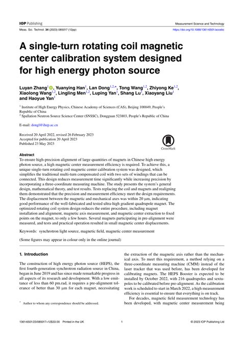 A Single Turn Rotating Coil Magnetic Center Calibration System Designed