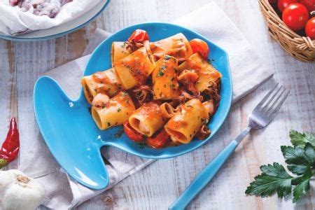 Calamarata Pasta With Calamari And Tomato Sauce Italian Recipes By