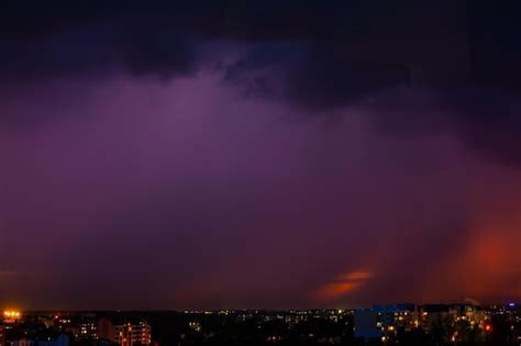 Premium Photo Lightning Strikes Storm Over City Purple Light