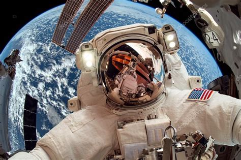 International Space Station And Astronaut Stock Editorial Photo