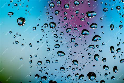 Premium Photo Beautiful Multicolored Water Droplets On A Glass