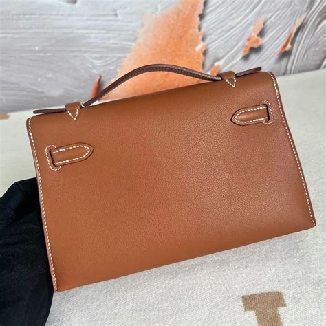 愛馬仕包包新加坡價格及圖片大全 Hermes Mini Kelly Pochette Swift Gold 金棕色 銀扣 Qatar