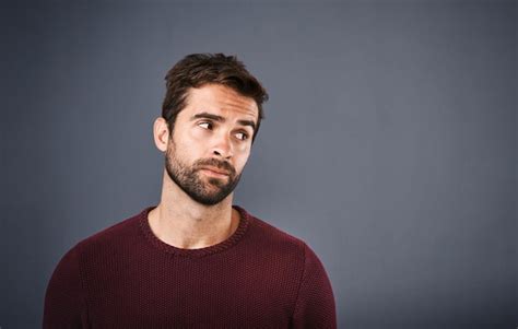 Premium Photo Doubt Thinking And Face Of Unsure Man In Studio With