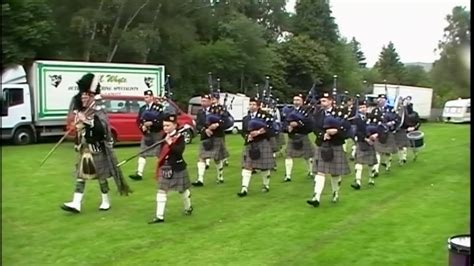 Archive Film Of Drum Majors Leading Ellon District RBL Pipe Band At