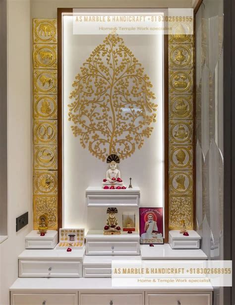 A White And Gold Display Case In A Room