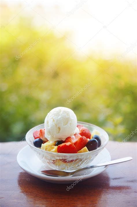 Fruit salad with ice cream — Stock Photo © DepositNovic #2568878