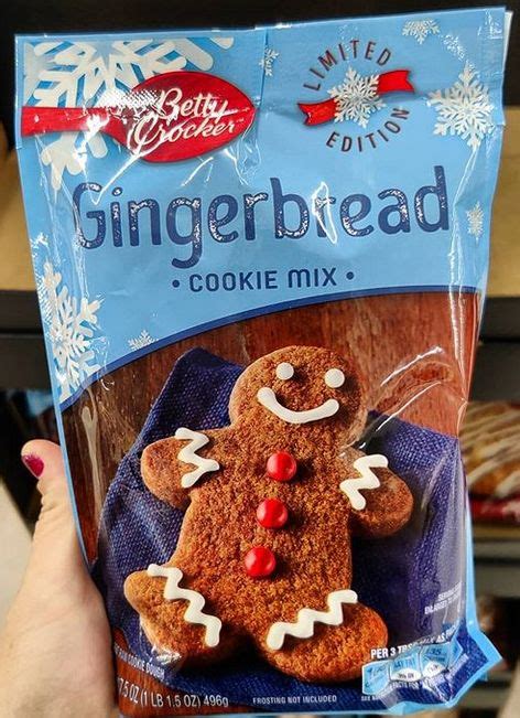 someone holding up a bag of gingerbread cookie mix