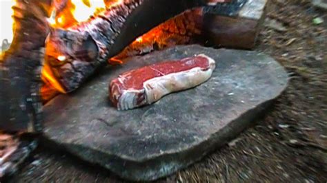 Primitive Survival Cooking Meat On A Rock Youtube