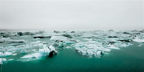 "Ice Floating On Glacier Lake In Winter" by Stocksy Contributor "Chris ...