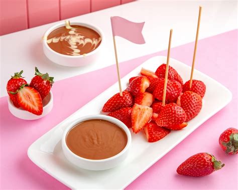 Free Photo | Strawberry chocolate fondue with melted chocolate and strawberry on table