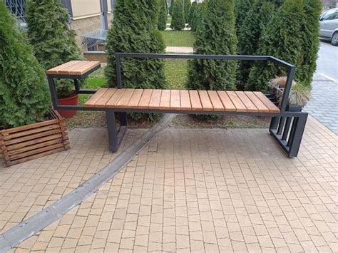 Premium Photo A Bench With A Metal Frame Sits On A Patio