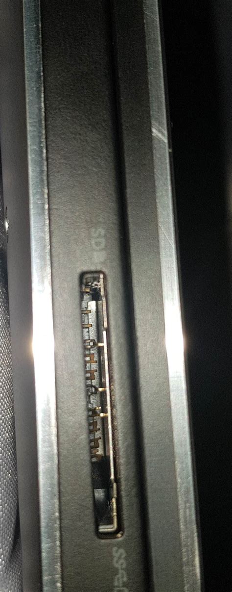 Sd card slot damaged after removing the sd card : r/Dell