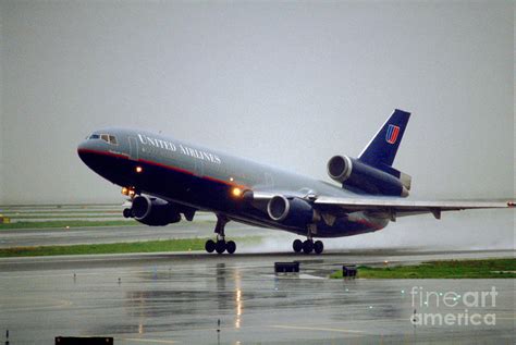 United Airlines UAL Douglas DC-10 Taking-off in the Rain Photograph by ...