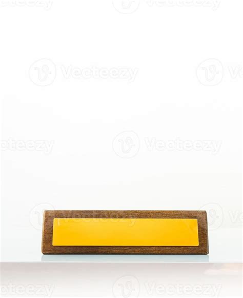 Wooden yellow business office plate in white background with title ...