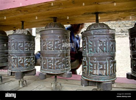 Man Spinning Prayer Wheels Upper Pisang Village Annapurna Circuit