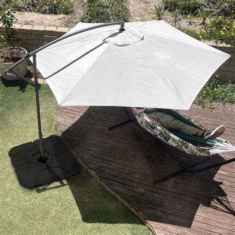 Pure Garden 10 Ft Steel Off White Cantilever Patio Umbrella With Base In The Patio Umbrellas