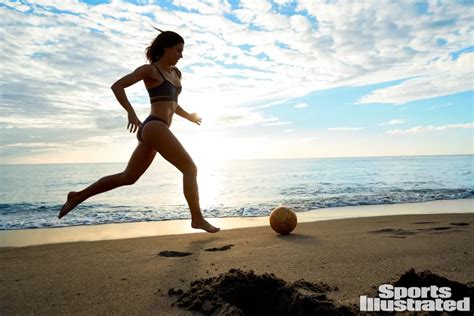 Our 8 Favorite Photos Of Alex Morgan Playing Soccer On The Beach In St