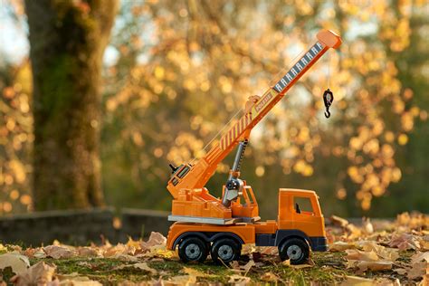 Photo of Orange Dump Truck Toy · Free Stock Photo