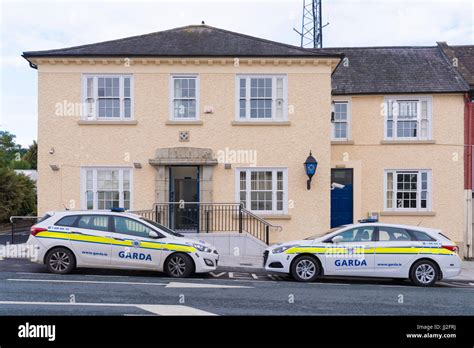 Two Liveried Patrol Cars Parked Outside A Garda Siochana Irish Police