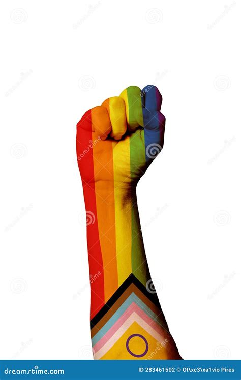 Vertical Shot Of The Pride Intersex Rainbow Progress Flag Painted On Human Raised Fist Stock