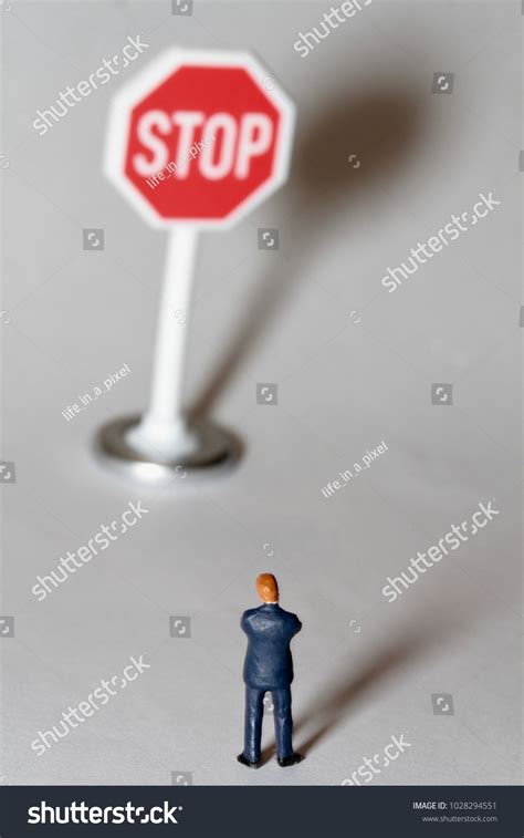 Businessman Miniature Stop Sign Stock Photo 1028294551 | Shutterstock