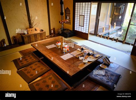 Interior Of A Traditional Japanese Restaurant With Tatami Flooring And