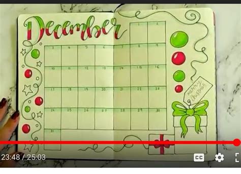 An Open Christmas Planner With The Word December Written On It And A