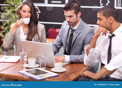 Business Meeting In A Cafe Stock Image Image Of Sitting 106288595